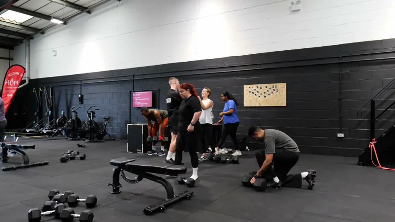 A small group training together on the Hōm gym floor